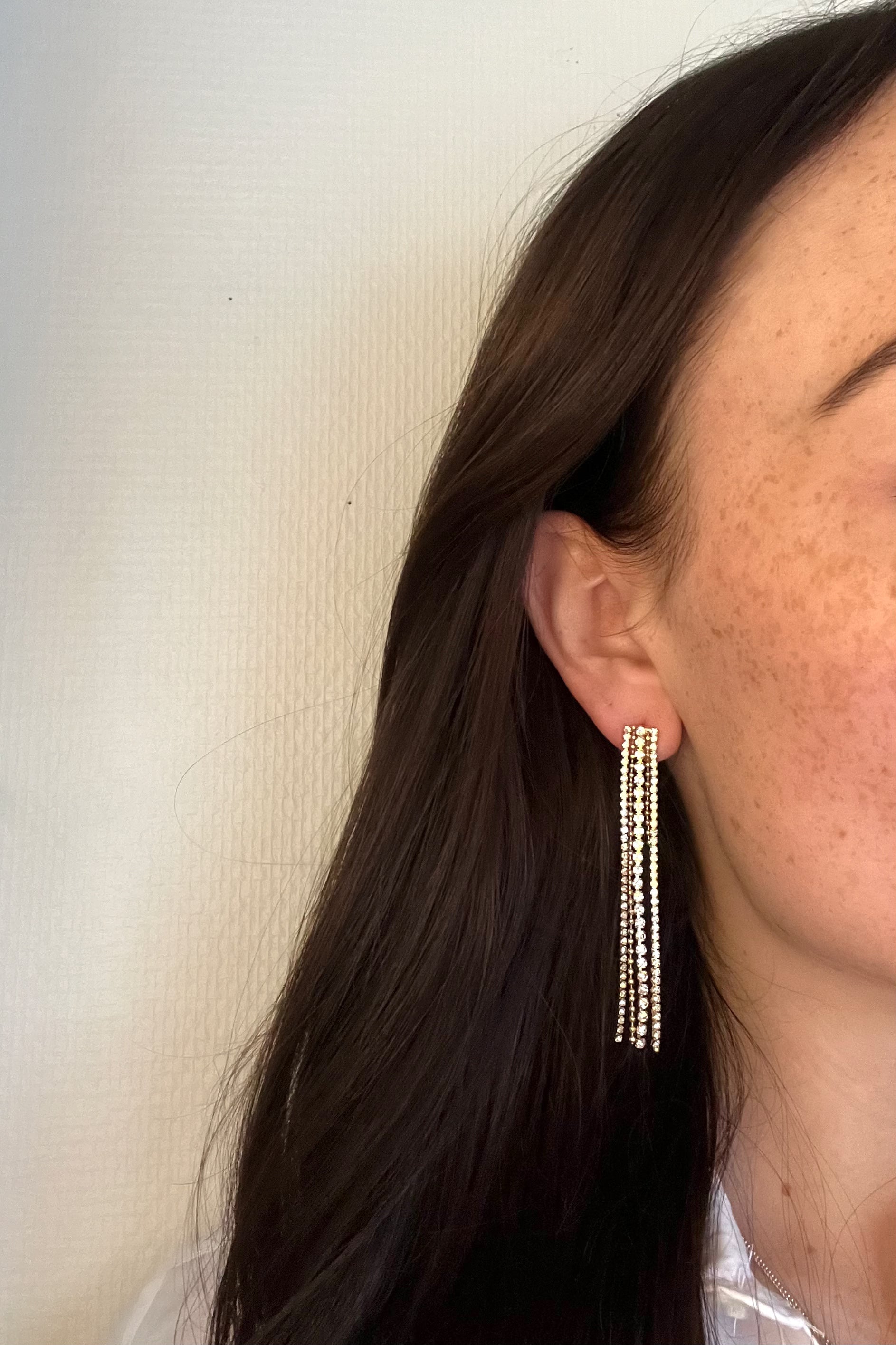 gold earrings with strass stones